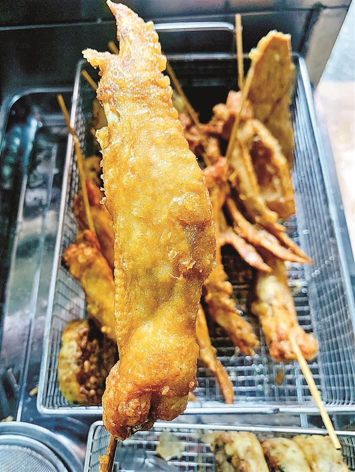 近期流行油炸美食，一场美食之旅探寻内心平静之道